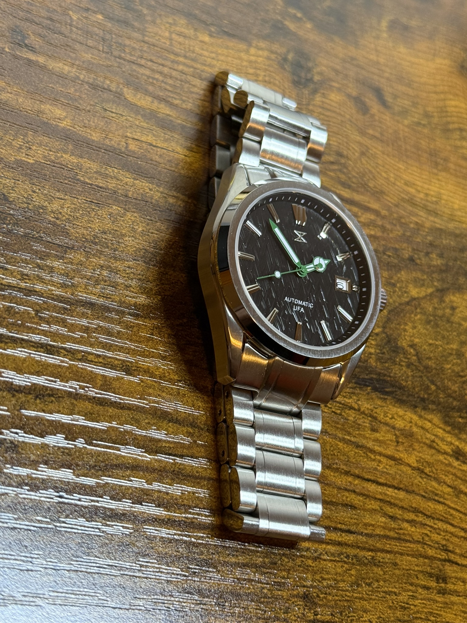 Trix automatic with herringbone dial on a steel bracelet