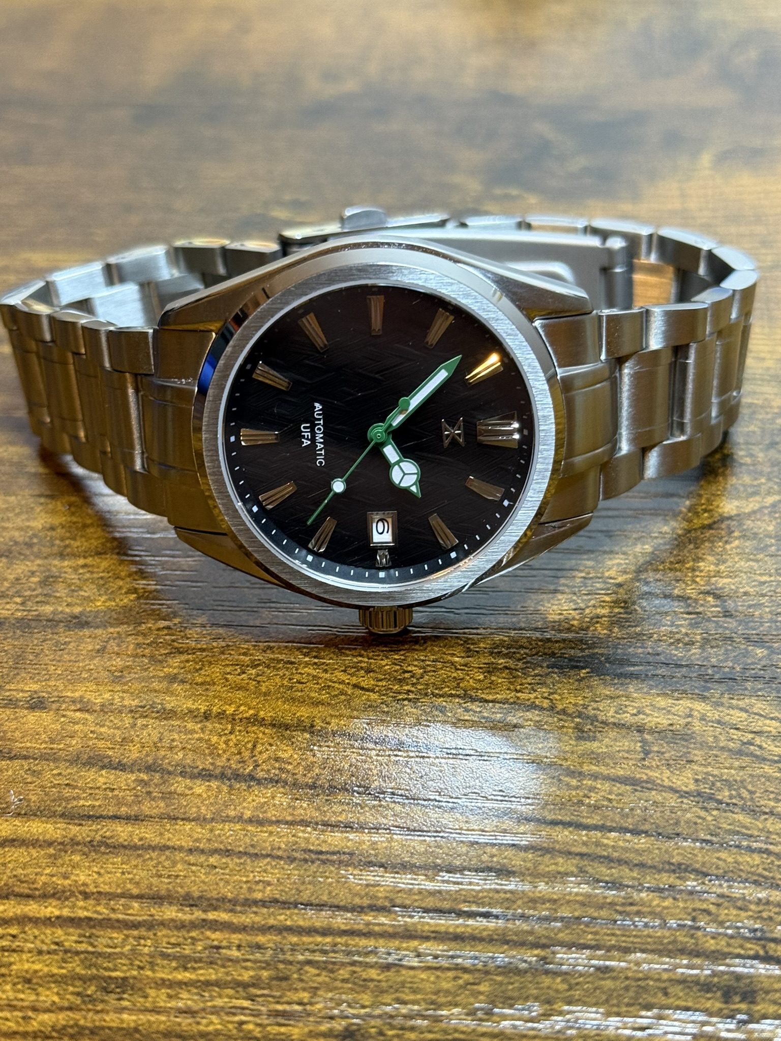 Trix automatic with herringbone dial on a steel bracelet