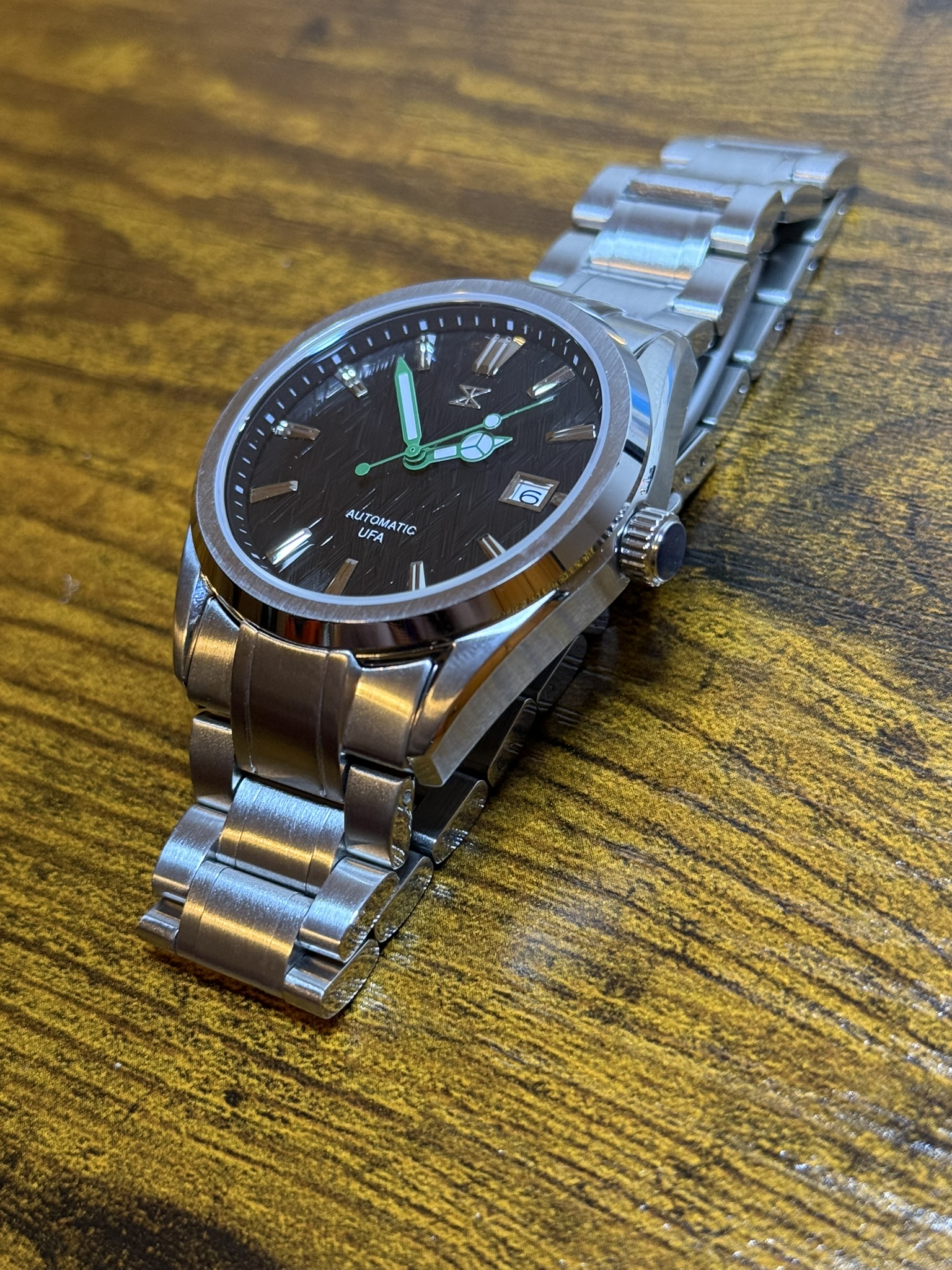 Trix automatic with herringbone dial on a steel bracelet